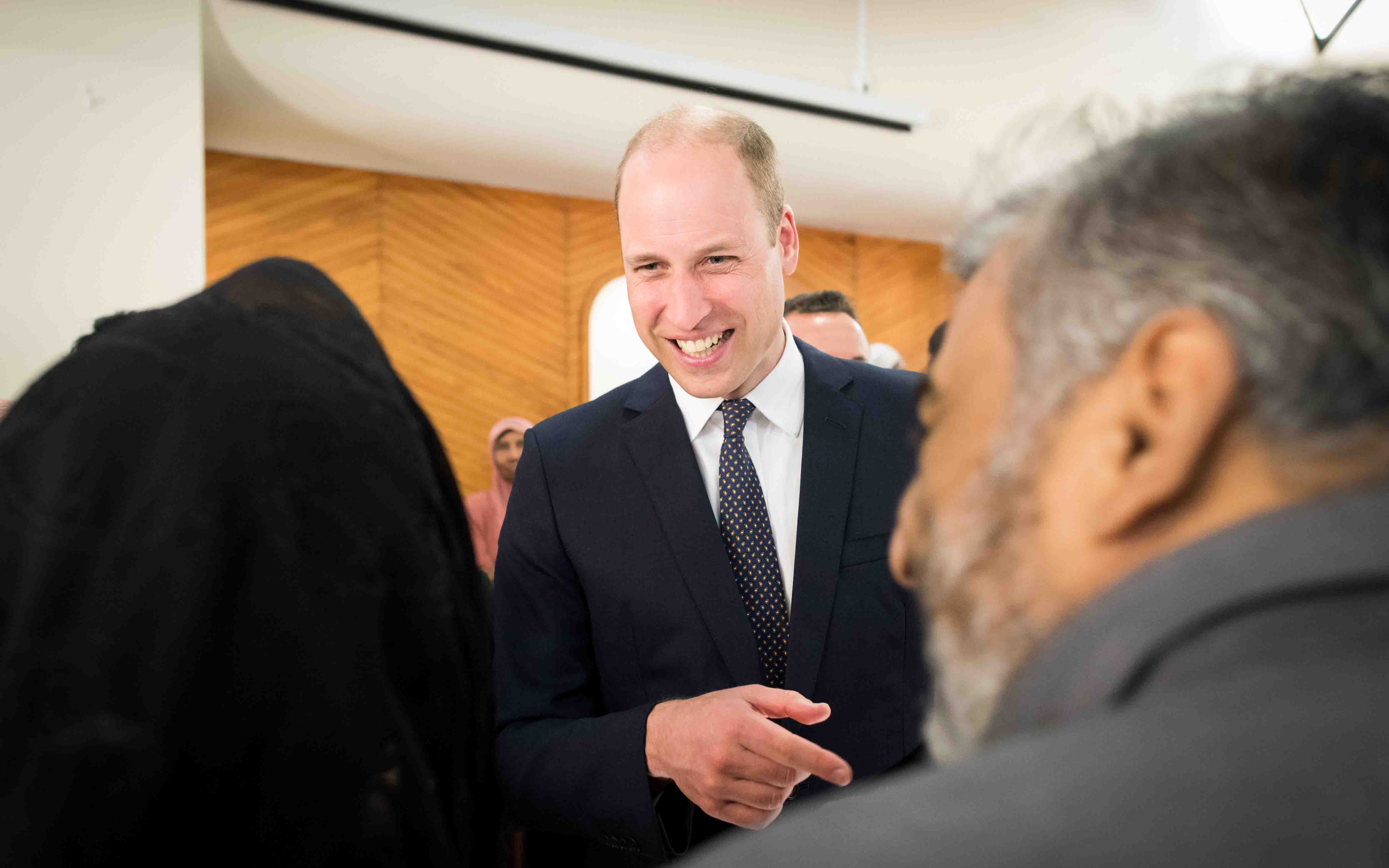 'Prince William talks with members of the Muslim community