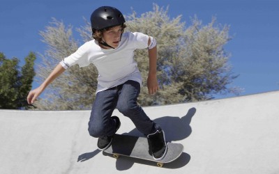A boy skateboarding.